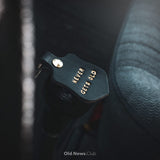 Leather Key Fob with gold embossed text in classic car
